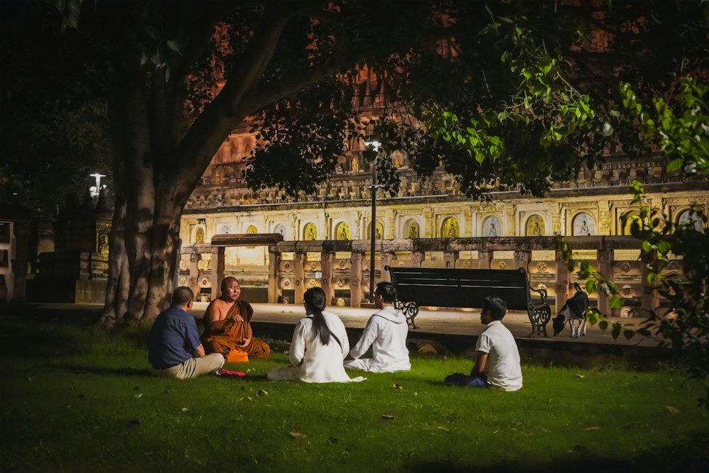 Monks and pilgrims in the Mahabodhi Temple gardens, Bodhgaya